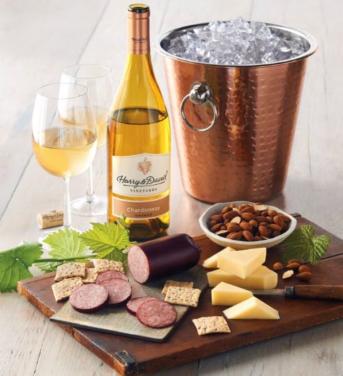 Copper Wine Chiller With Meat And Cheese | Food For Net Wooden cutting board with wine, cheese and an ice bucket.