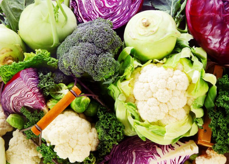 Several types of cruciferous vegetables are grouped together, including broccoli, cauliflower, red cabbage, and kale.