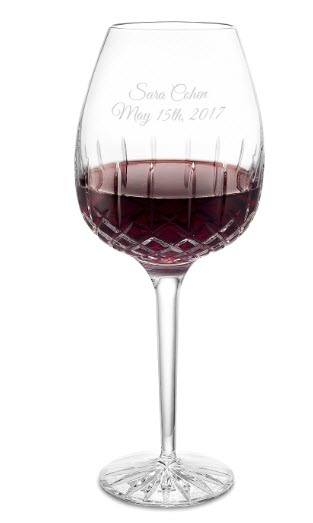Crystal Red Wine Glass | Food For Net Crystal glass containing red wine with an engraving