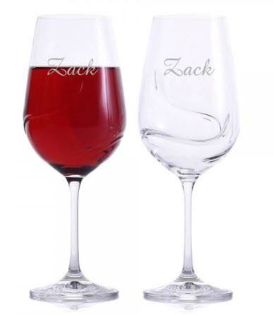 Crystalize Turbulence Wine Glass | Food For Net Two glasses, one filled with red wine, both with turbulence-like patterns