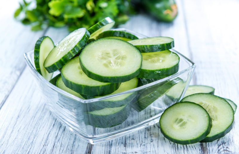 A glass bowl of cucumber