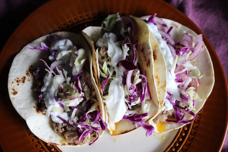 Curried Lamb Tacos with Cabbage Slaw and Cilantro-Lime Yogurt