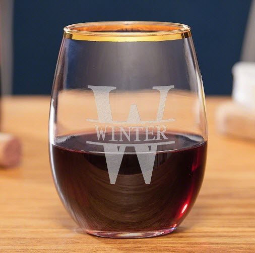 Custom Gold Rim Wine Glass | Food For Net Wine glass with red wine and a golden rim.