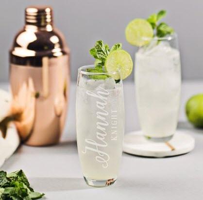 Customized Champagne Glasses | Food For Net Two champagne glasses, greenery and a cocktail shaker