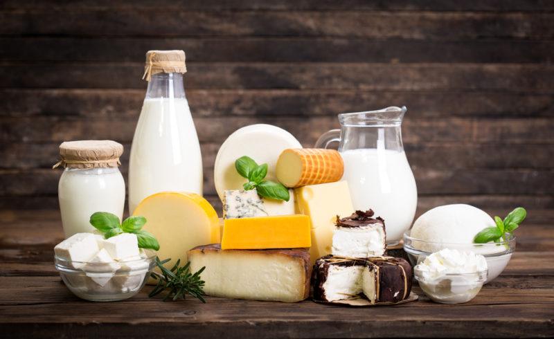 A selection of dairy products, including cheese and milk