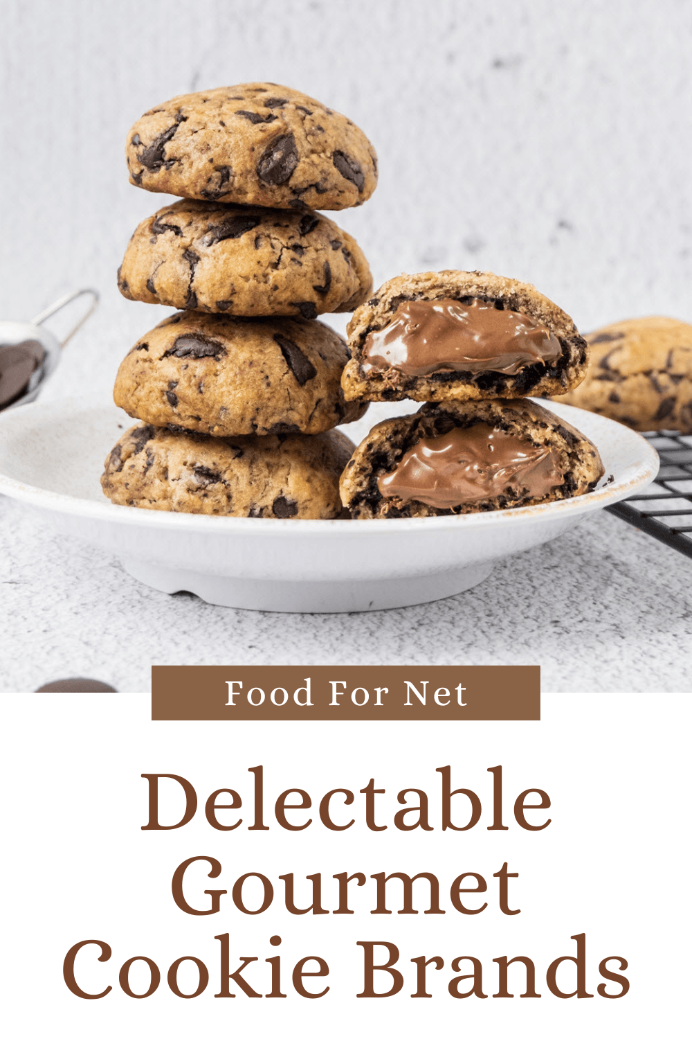 A stack of four chocolate chip cookies, plus two cookies next to them that have been cut to show a chocolate filling, highlighting the idea of gourmet cookie brands