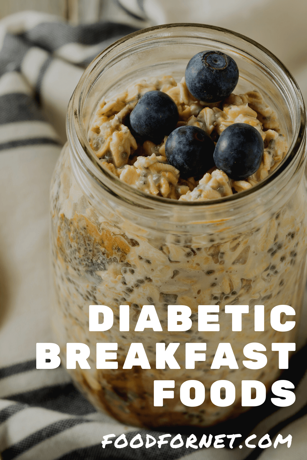 A mason jar containing overnight oats and blueberries.