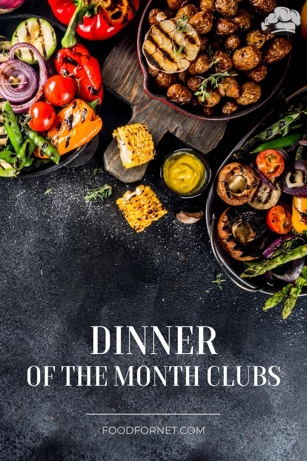 overview shot of a spread of delicious dishes on a dark-colored surface with text overlay "Dinner of the Month Clubs"