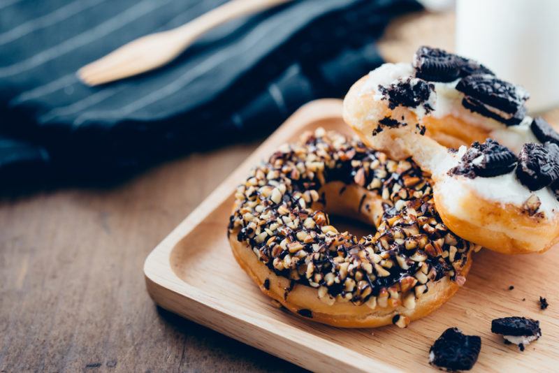 Donuts on a wooden tray