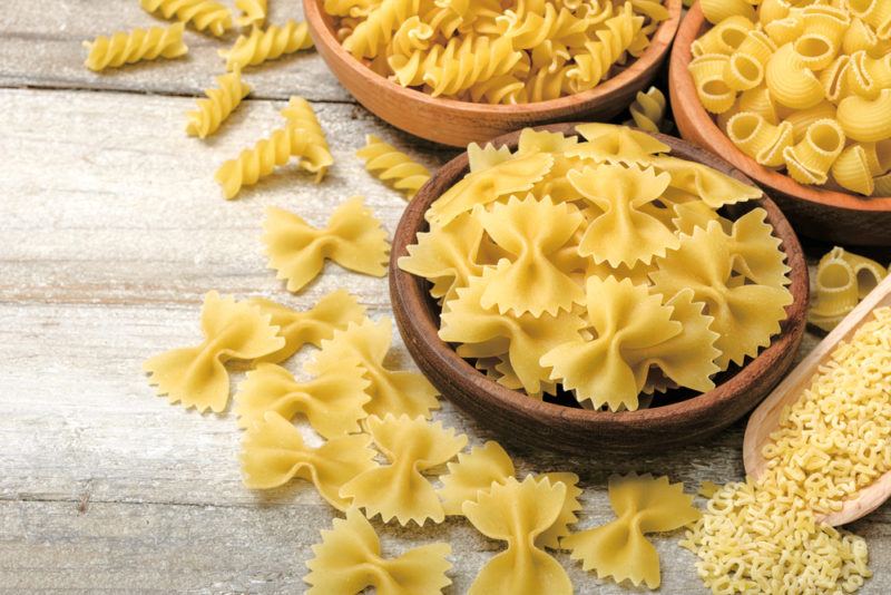 Dried pasta on a wooden table