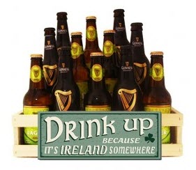 Wooden box filled with 12 Irish beers and a sign that says 'Drink Up because It's Ireland Somewhere'