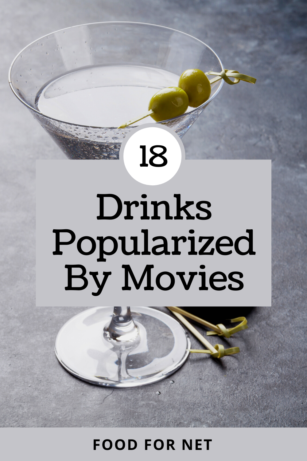 A vodka martini on a gray table, focusing on the idea of drinks popularized by movies