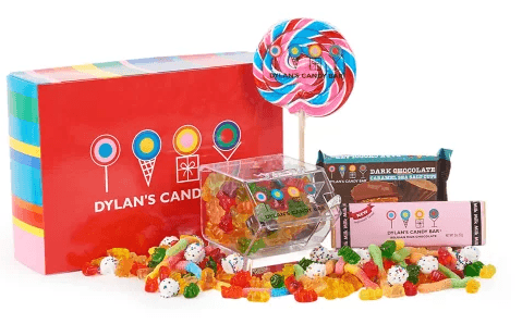 A selection of candy in front of a red box