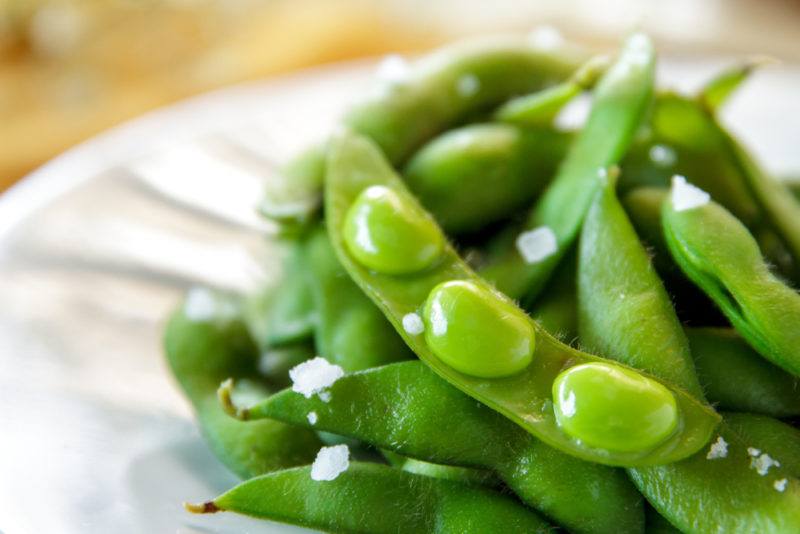 Fresh edamane on a white plate