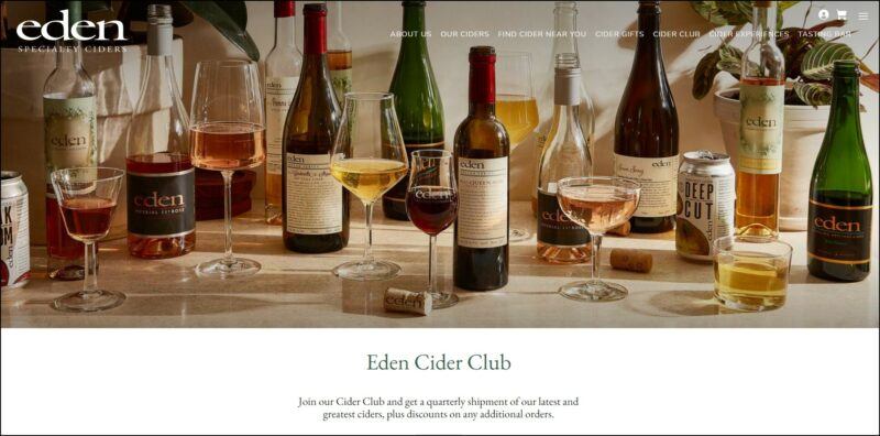 screenshot of Eden Cider Club's web page, header is with an editorial image of different bottles of ciders, the website's name and main menu, underneath is the details of the cider  club on a white background