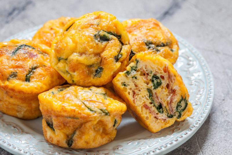 A selection of egg muffins with greens