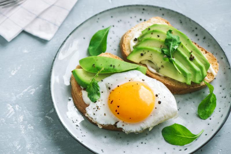 A plate with avocado and egg