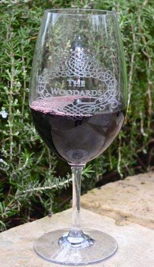 Etched Tritan Wine Glasses | Food For Net Etched wine glass outside with red wine
