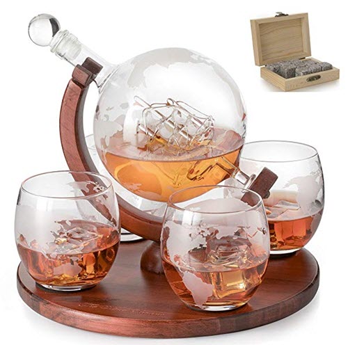 Etched World Decanter Whiskey Globe | Food For Net A globe containing whiskey, along with various whiskey glasses