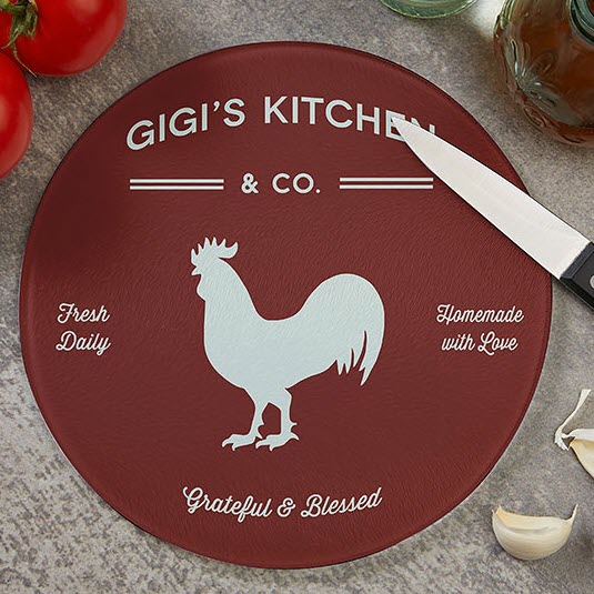 Farmhouse-Kitchen-Round-Glass-Cutting-Board | Food For Net Red circular cutting board with a rooster