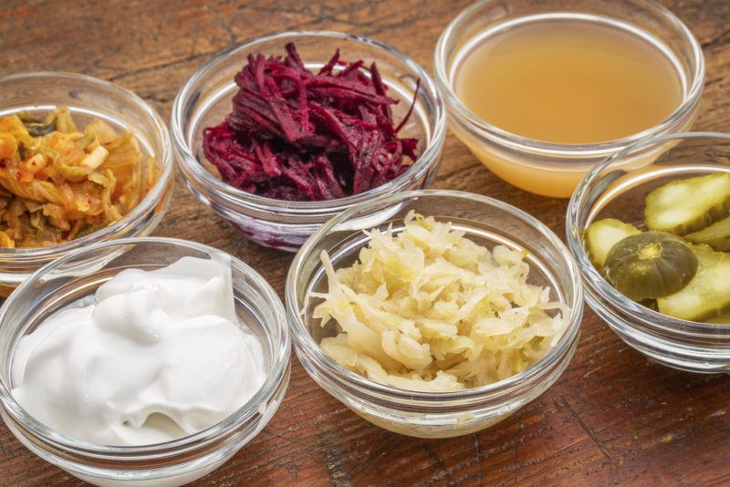 Six bowls of various fermented foods