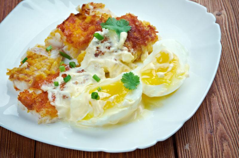 A poached Finnan Haddie on a white plate