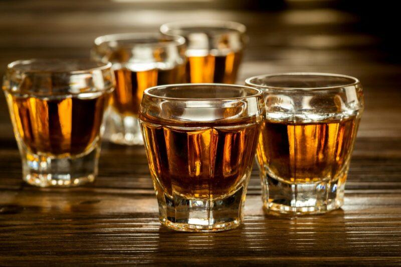 A selection of five shots on a table, which are all 11th hour shots