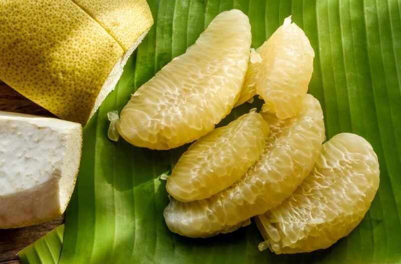 A banana leaf with pieces of dangyuja fruit flesh