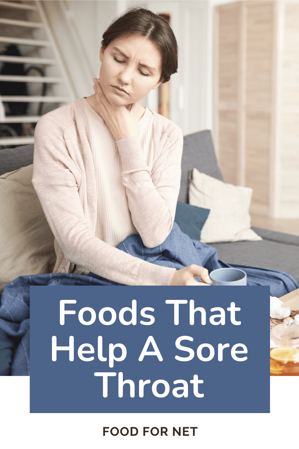 Foods That Help A Sore Throat. A young woman holding her throat with a cup of hot lemon drink, highlighting the power of foods that help a sore throat