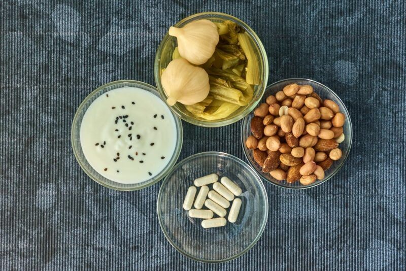 Three dishes of fermented foods and one that contains a small number of probiotics