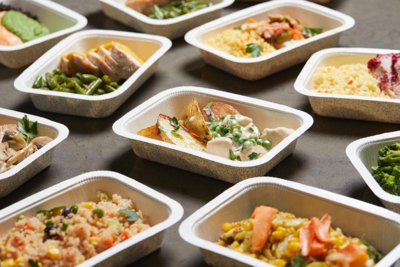 A collection of freezer meals on a table