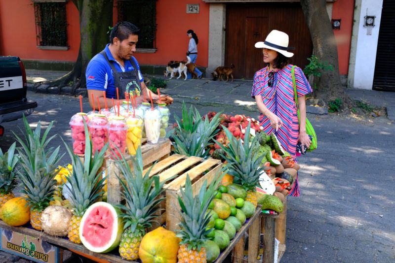 A street vendor in Mexico selling fresh fruit