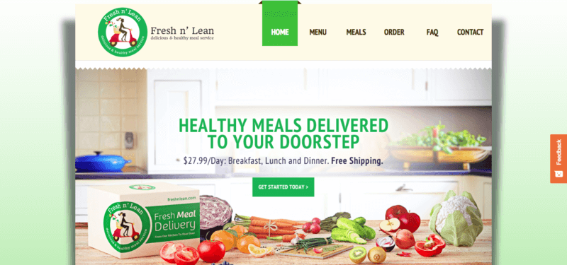 Fresh n' Lean website screenshot showing a kitchen counter with a Fresh n' Lean box and various fruits and vegetables