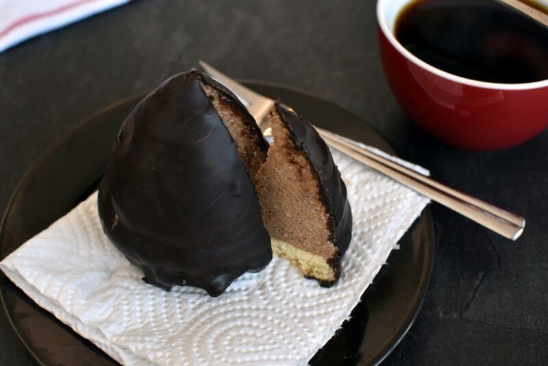 A dessert called the German granatsplitter served next to a mug of coffee