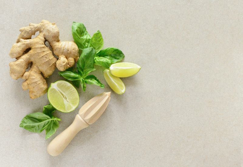 Ginger, limes, leaves and a juicer