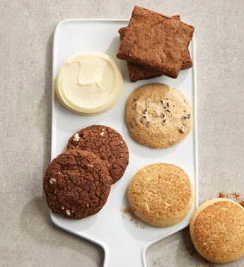 Various cookies on a white tray