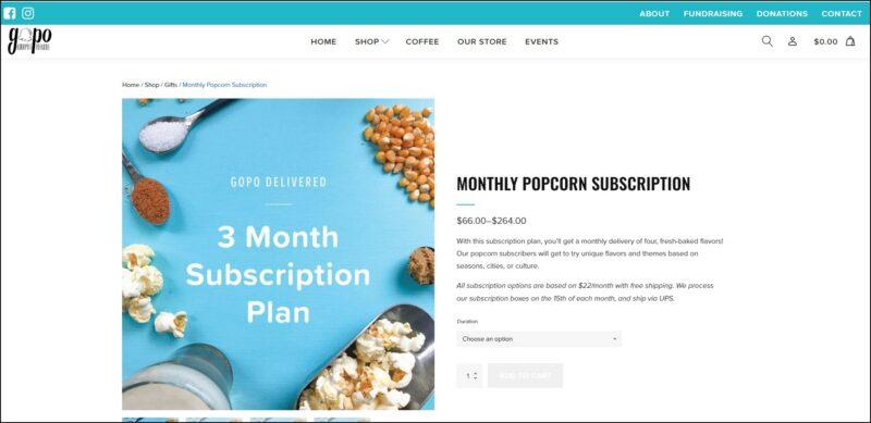 screenshot of GoPo Monthly Popcorn Subscription's web page, with turquoise bar on top bearing the social media icons and menu, underneath it is the white header with the website's name and main menu, the page is showing the details of the popcorn subscription along with a photo showing an overhead shot of different popcorn flavors on a sky blue background with text overlay