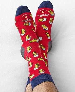 Red socks with blue and gray accents, showing images of beer. 