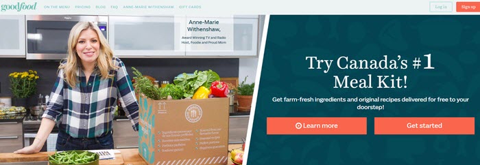 A young woman in the kitchen with various plants and fresh food