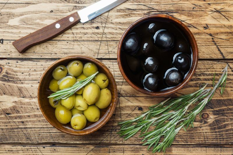 Green and black olives in brine