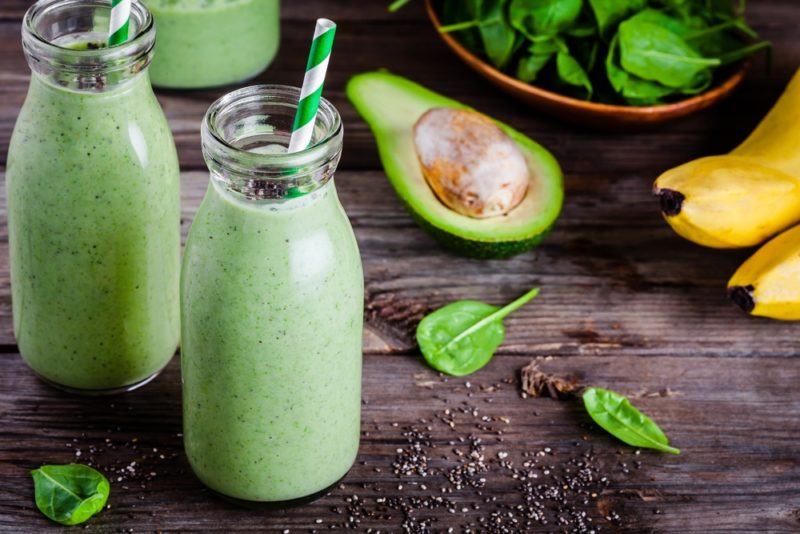 Green smoothies with avocado, spinach and banana