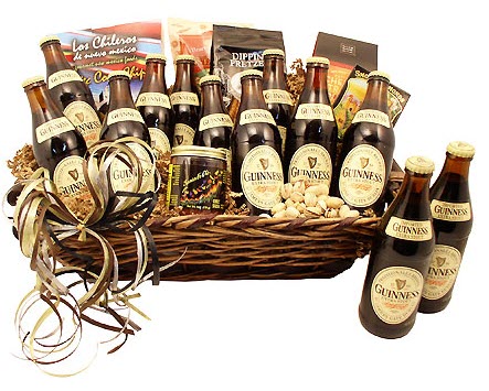 Large basket containing may bottles of Guinness, along with various snacks.