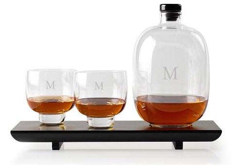 Handblown Whiskey Decanter And Tray | Food For Net A wooden tray with an unusual monogrammed decanter and two glasses.
