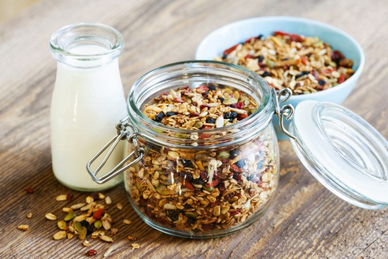 A jar and a bowl of homemade granola