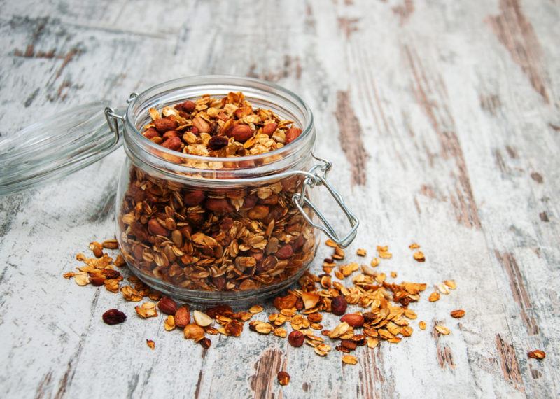 A glass jar filled with homemade granola