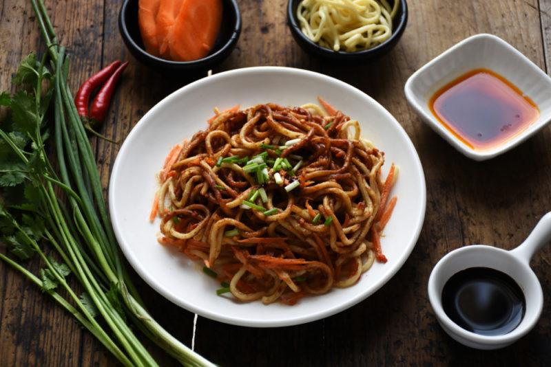 A white dish of hot and dry wheat noodles