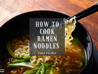 A black bowl of ramen, where someone is pulling the noodles out using chopsticks, highlighting how to cook ramen noodles
