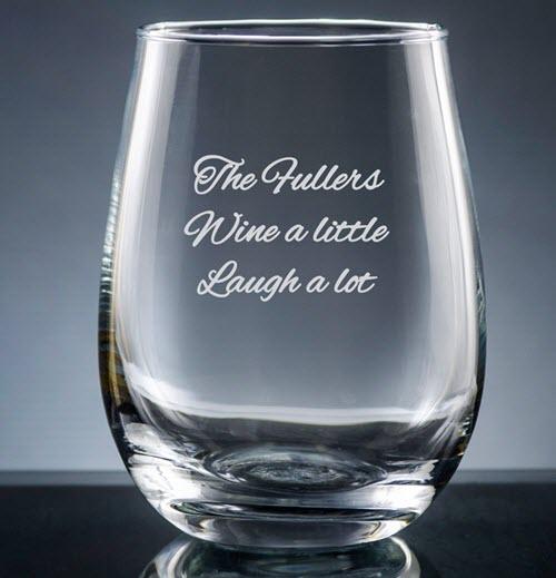 Iguala Stemless Wine Glass | Food For Net A clear stemless wine glass with engraved text