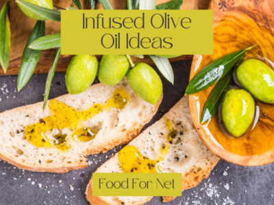 Olives that have been covered in oil, next to oil soaked bread, highlighting the idea of infused olive oil