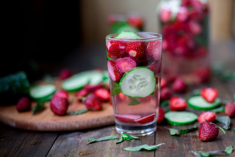 Infused water that contains strawberry and cucumber